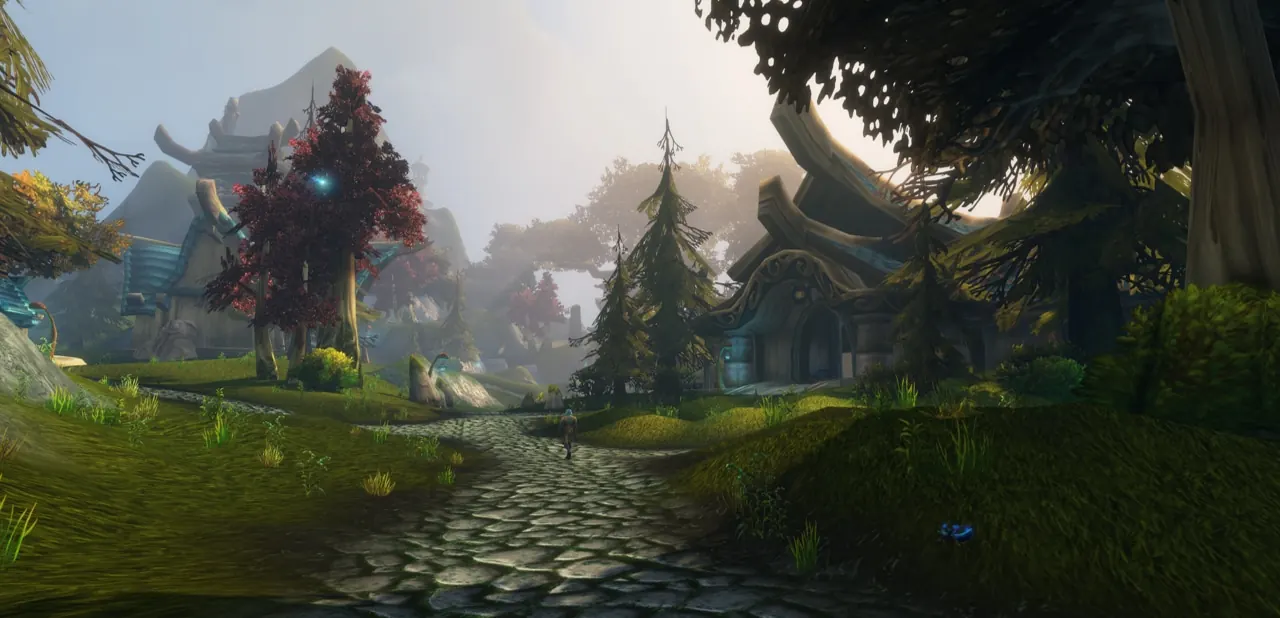 A cobbled road through a sunlit Skyborne settlement among trees on Zephras Isle